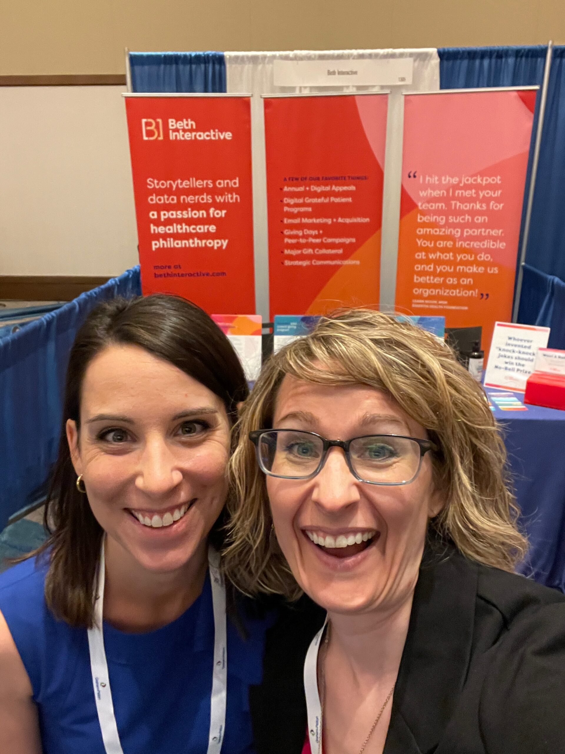 Lauren Short and Beth Hatcher welcome colleagues at the Beth Interactive booth at AHP